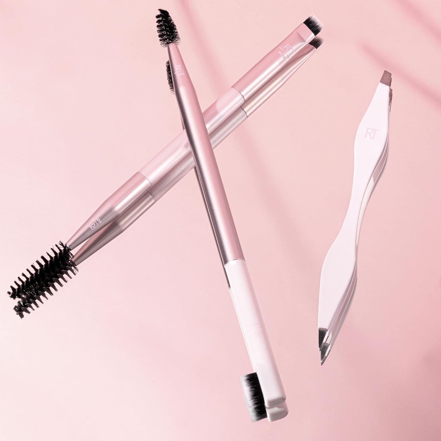 image:imageReal Techniques Brow Shaping Set Spoolie Tweezers amp Brow Brushes DualEnded Tools For Styling amp Shaping Eyebrows Get Full Fluffy Brows Multiuse Brushes CrueltyFree 3 Piece SetBrow Shaping Set